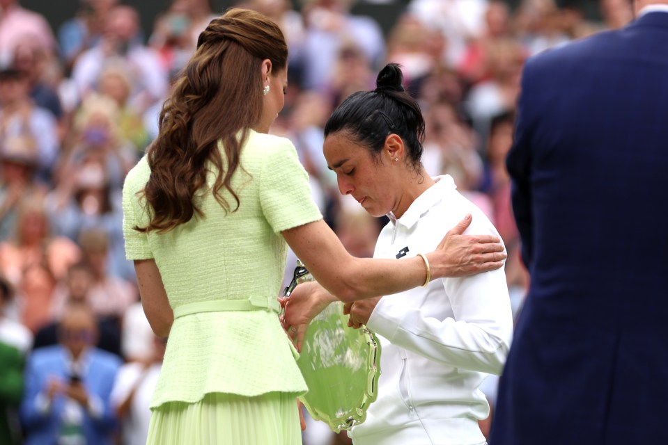 Kate rubbed Jabeur's shoulder following her heartbreaking loss