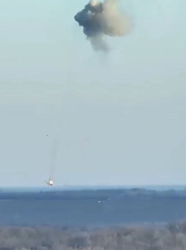 The Russian helicopter plummets from the sky just moments before it smashes into the ground