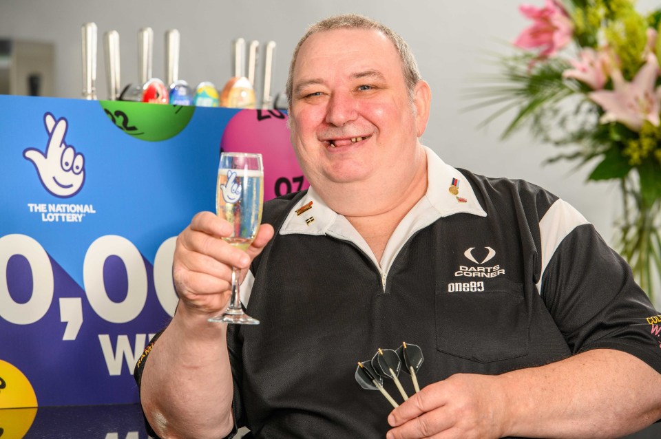 Clive Bray, 58, from St. Austell, Cornwall, celebrates his £300,000 National Lottery win