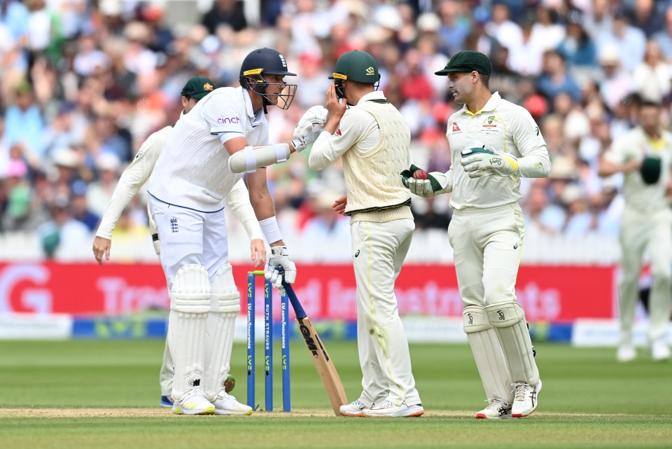 Stuart Broad, left, went over to Alex Carey, right, following Jonny Bairstow's controversial dismissal