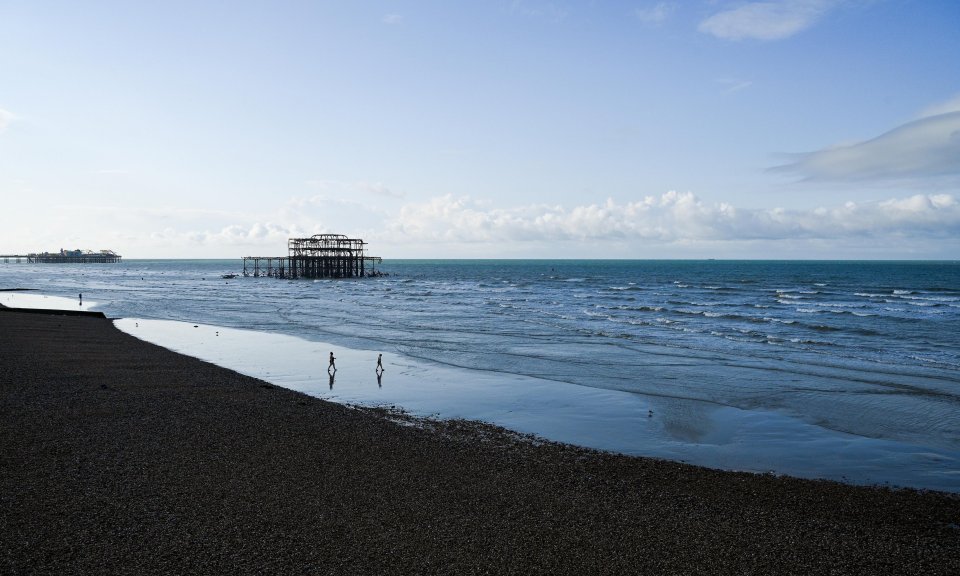 Temperatures in the late-teens provide ideal conditions for a quick dip, as these beachgoers enjoyed in Brighton, Sussex this morning