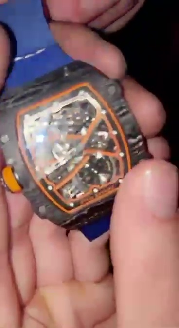 st spoke to caller Jay who has sent the attached video and stills of what appears to be Lando Norris's stolen watch, which he says was shown to him at 1am in Wembley by two chaps with Liverpool accents., , They asked him directions to Wembley International Hotel and admitted they had nicked it from a bloke with a flash car on the Wembley car park., , Our tipster says they asked him where they could sell it and one of them gave him their phone number, which he is prepared to give us - but he wants money., , He is willing to cooperate with the police on us and hand over the video, story and the mugger's number but is not willing to cooperate with the police., , The stolen £40,000 watch is a unique prototype and I was told by makers Richard Mille it has a blue strap. This would appear to be the watch., , Said I'd speak to my boss and ring the tipster back .