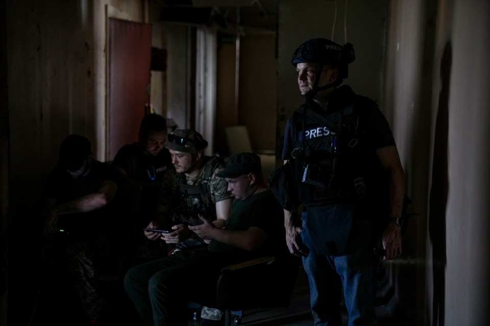 Ukraine troops communicate with their gun crew via an encrypted messaging app