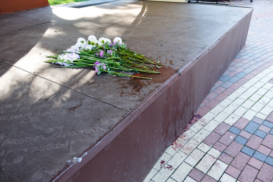 Flowers have been laid at blood spattered spots across Chernihiv