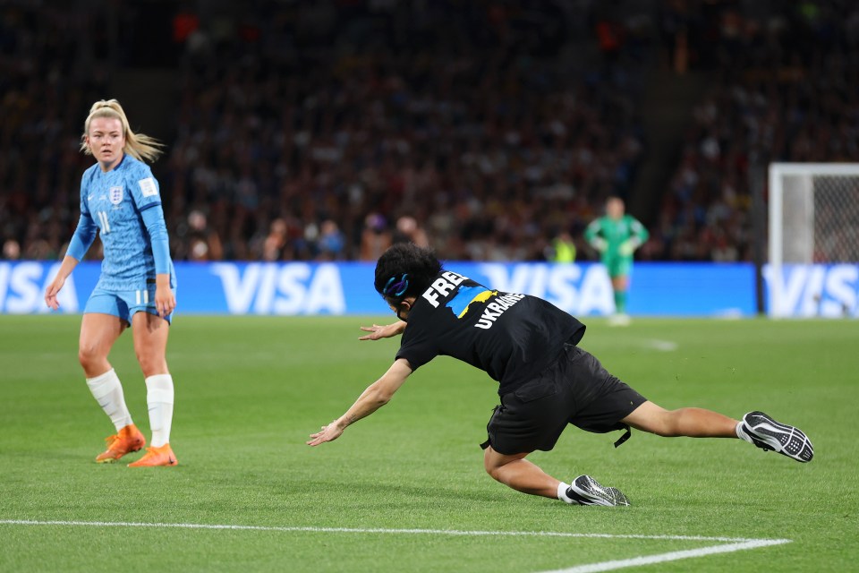 A pitch invader was able to momentarily get past security before falling over