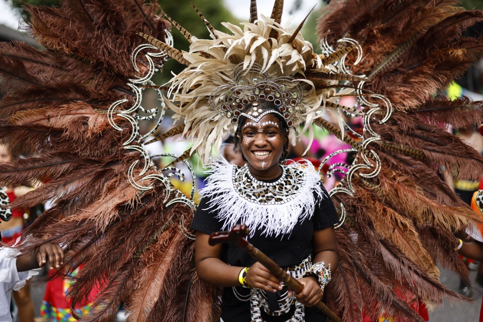 A dancer wore this eye-catching outfit complete with huge feathers