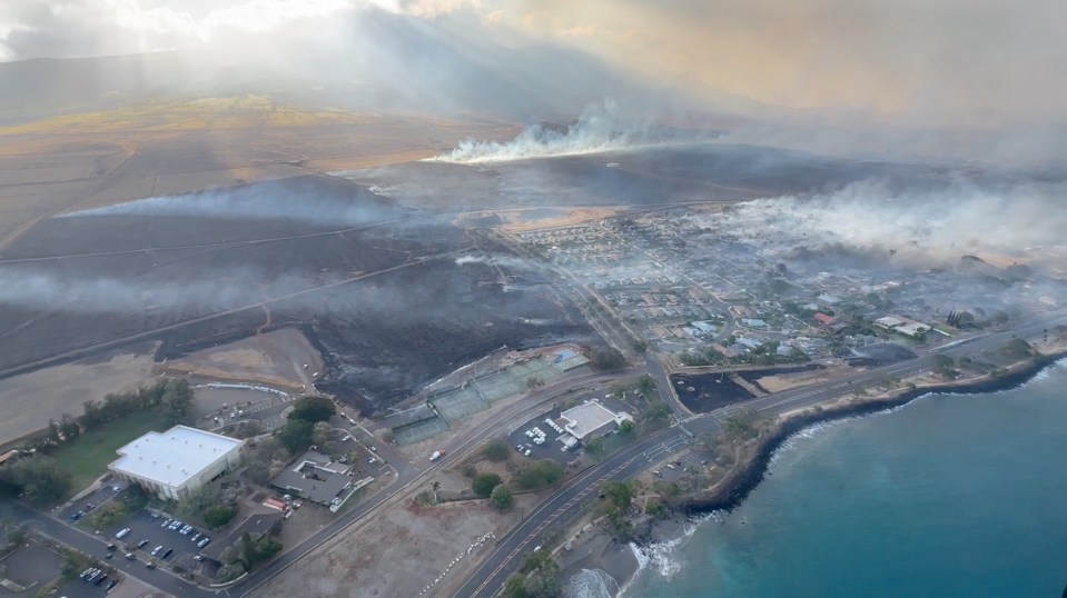 An aerial view shows smoke from the wildfires on the island of Maui, Hawaii