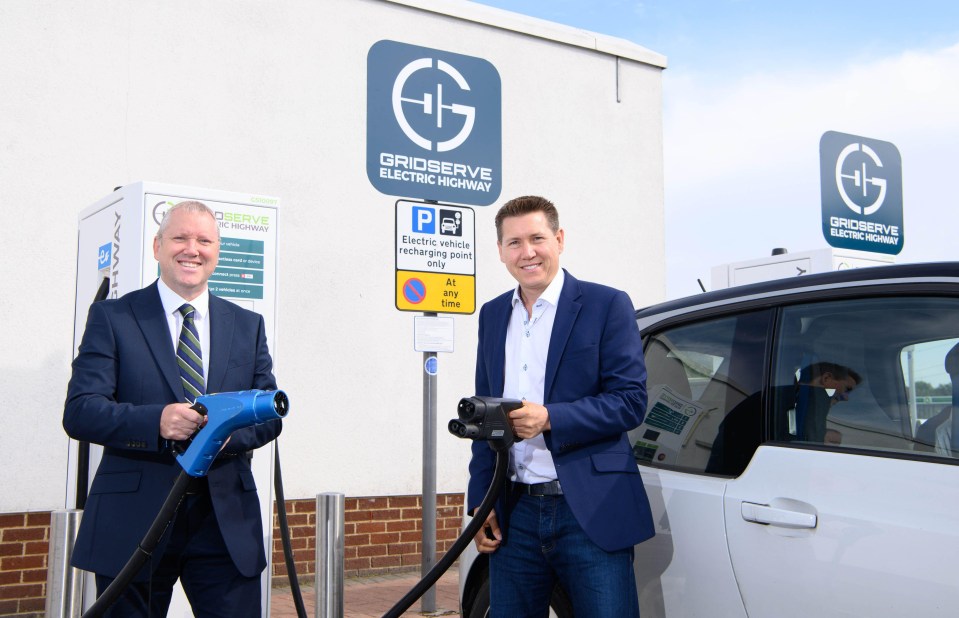 2G60JEH EDITORIAL USE ONLY (Left to right) Ken McMeikan CEO of MOTO and Toddington Harper, Founder and CEO GRIDSERVE attend the launch of ???Electric Highway??? at Toddington Services, a UK-wide network of more than 50 ???Electric Hubs???, featuring 6 to 12 high-powered 350kW EV chargers per site, across the whole of Britain. Picture date: Thursday July 1, 2021.