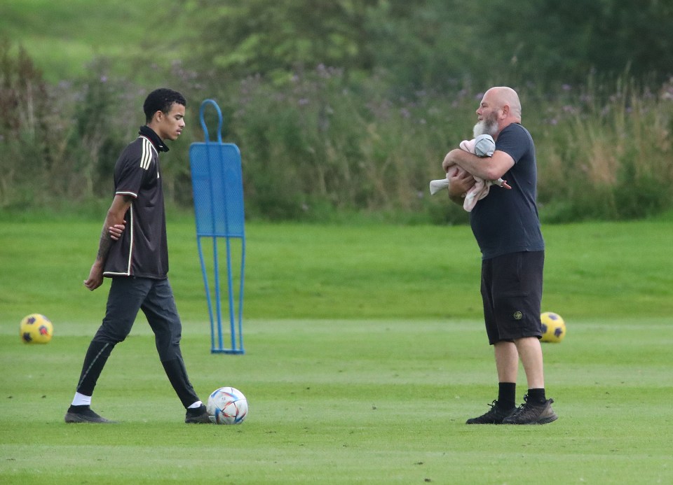 Mason Greenwood at a training session with his dad and newborn daughter