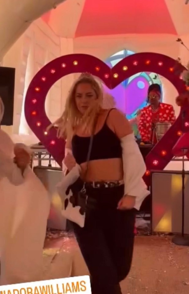 Josie Gibson revealed her incredible figure as she partied in a crop top at Camp Bestival