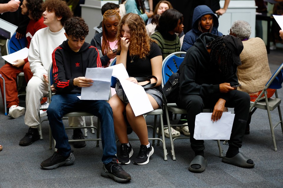 Students receive their GCSE results at the City of London Academy