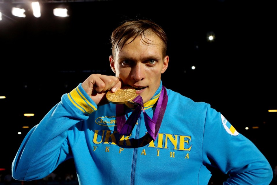 LONDON, ENGLAND - AUGUST 11: Gold medalist Oleksandr Usyk of Ukraine celebrates after the medal ceremony for the Men's Heavy (91kg) Boxing final bout on Day 15 of the London 2012 Olympic Games at ExCeL on August 11, 2012 in London, England. (Photo by Scott Heavey/Getty Images)