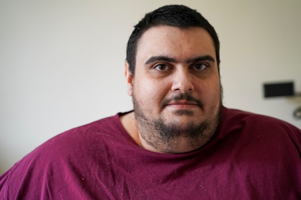 Ian Whittaker. 27/10/2021. Jason Holton, 30, Britain's  fattest man, photographed at his home in Surrey. Photo credit : Ian Whittaker