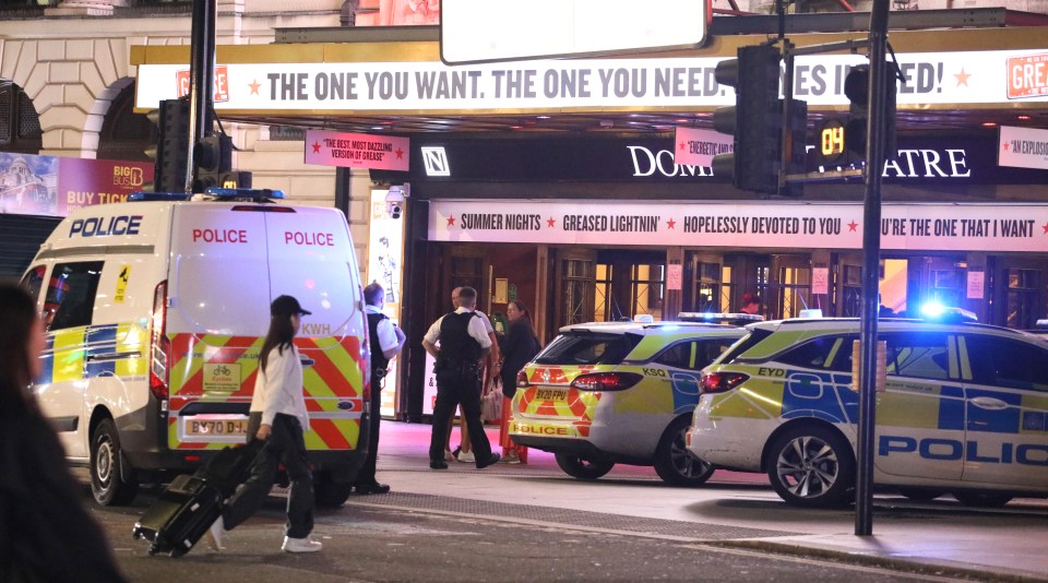 Police were met with applause as they removed two rowdy couples from a performance of Grease The Musical