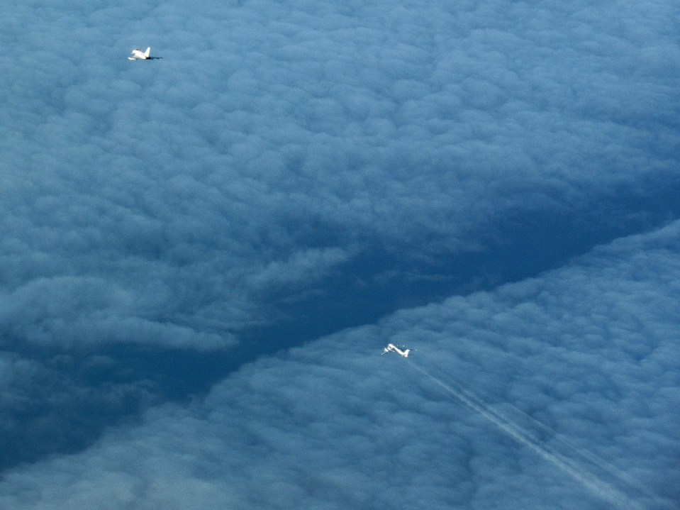 The bomber flies as it is shadowed by the RAF Typhoon