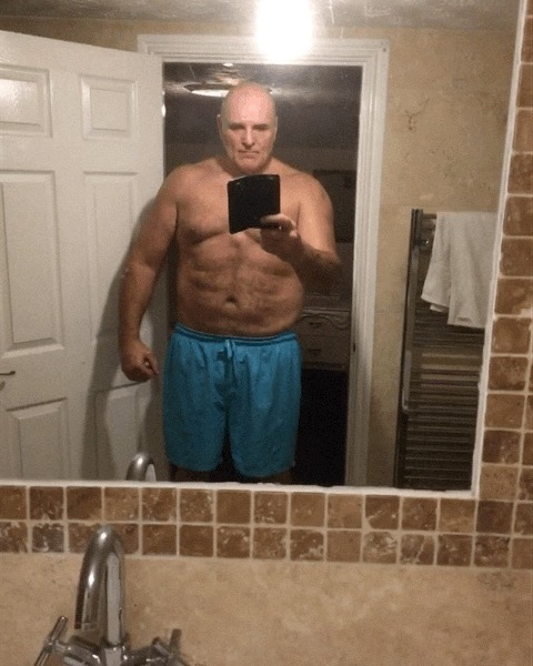 John showcased his torso after losing weight from daily runs and gym workouts