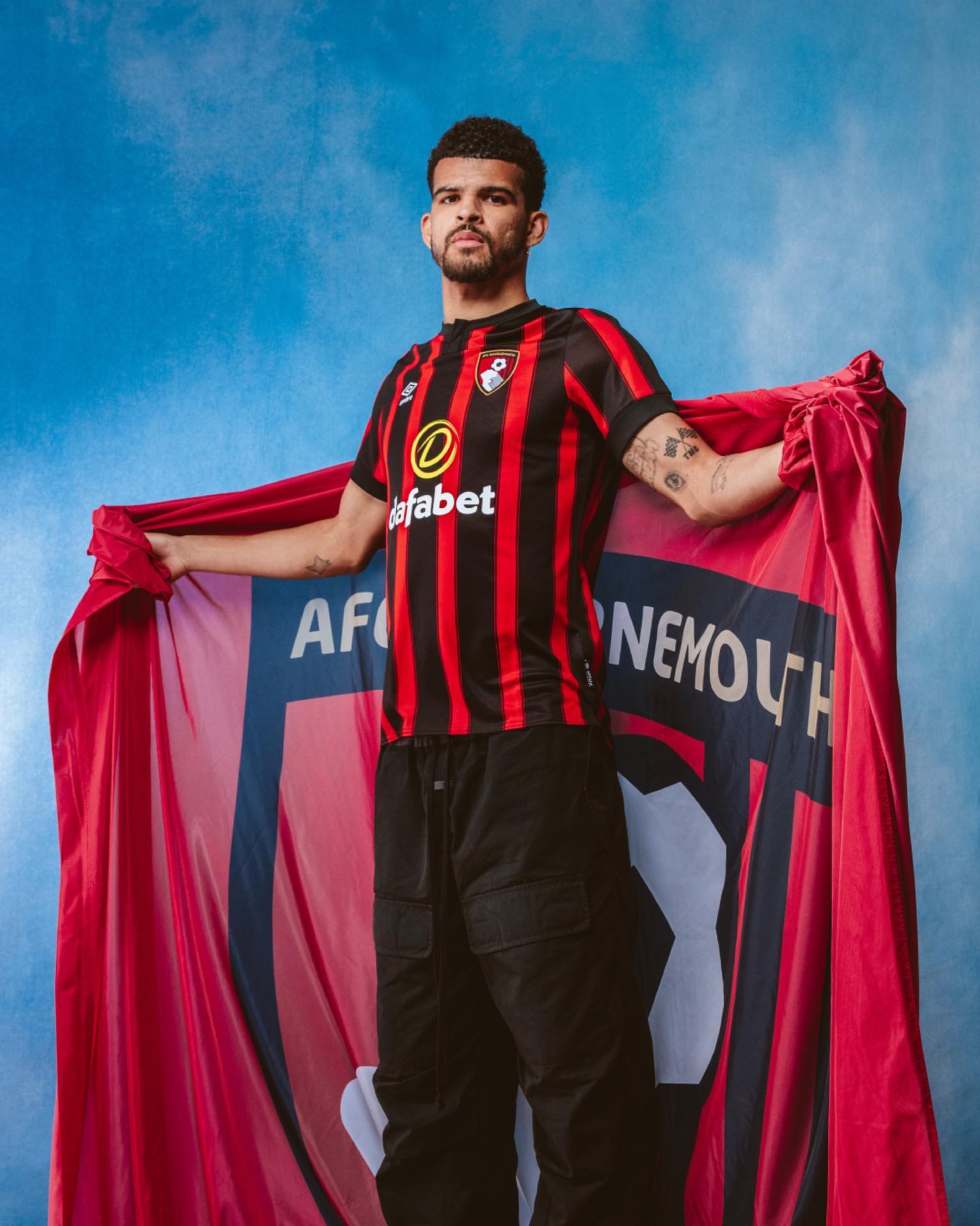 Black with the thinner red stripes is a winning combination for Bournemouth