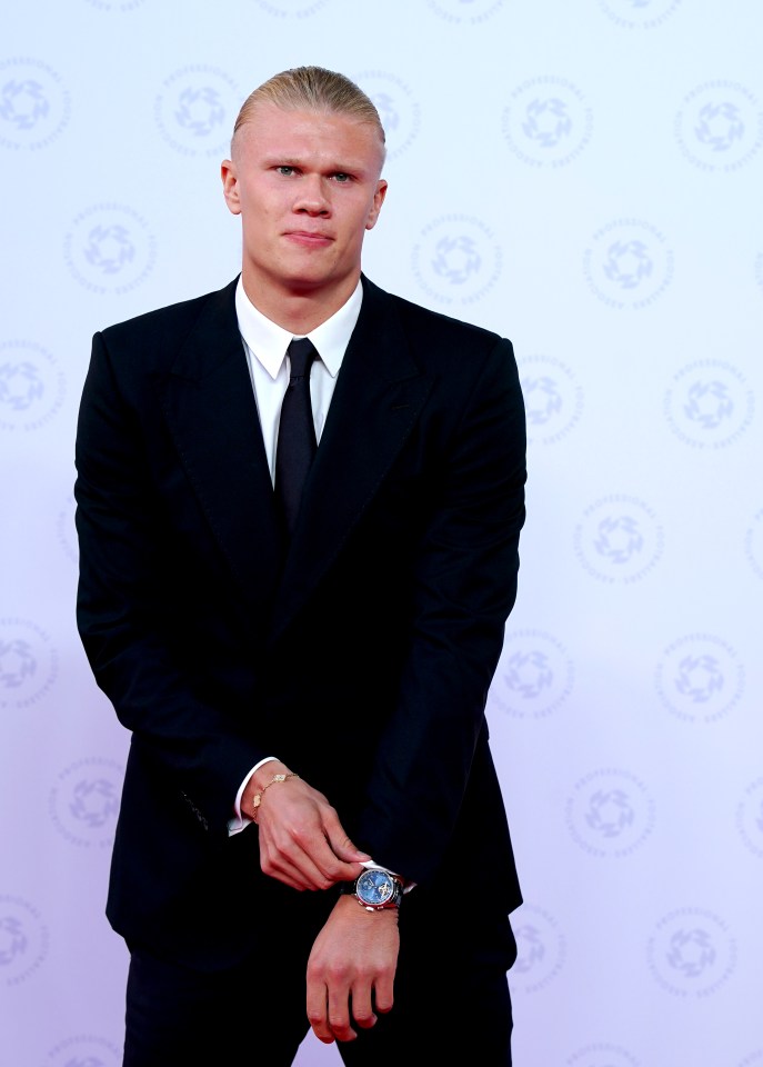 Man City star Haaland looked sharp in a dark suit