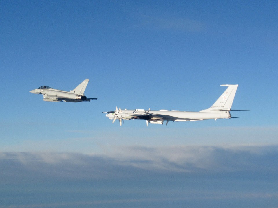 One of the Typhoons pictured flying alongside the Russian 'Bear' bomber near Scotland