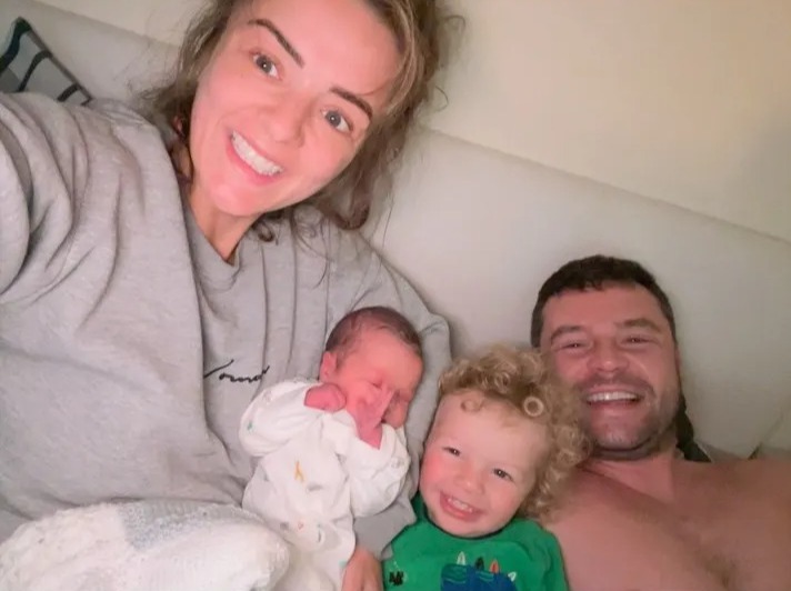 Danny Miller and his wife Steph with their newborn baby daughter and son Albert