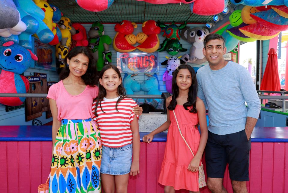 The PM with his wife and daughters Anoushka and Krishna, second left, at Santa Monica Pier