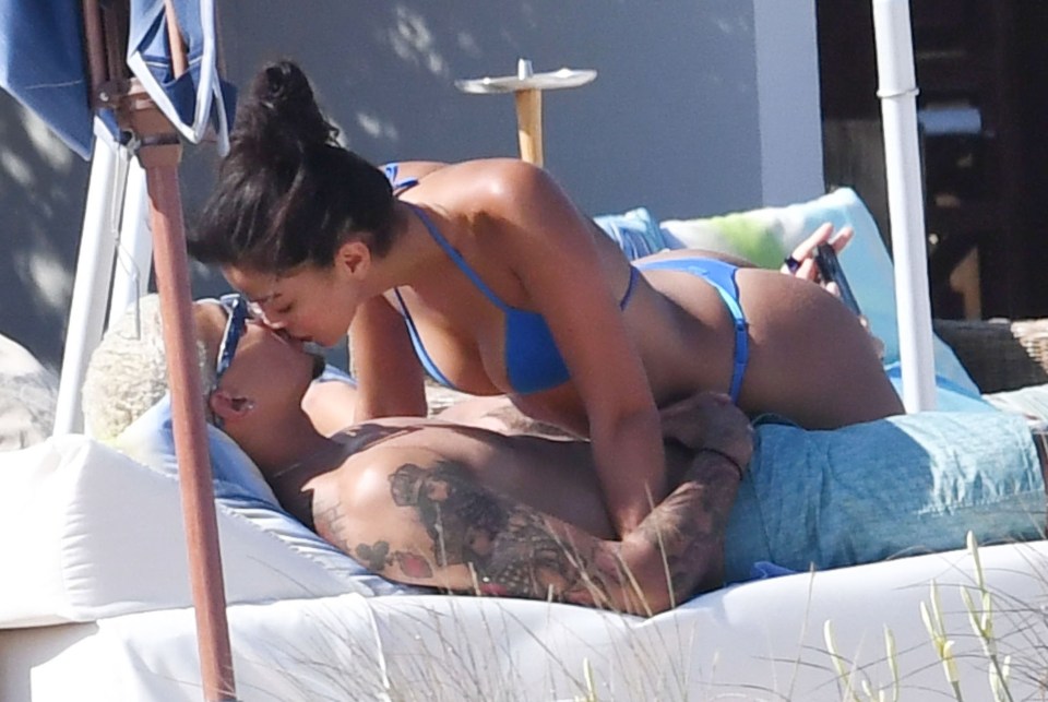 The pair packed on the PDA with a series of passionate kisses at Nikki Beach