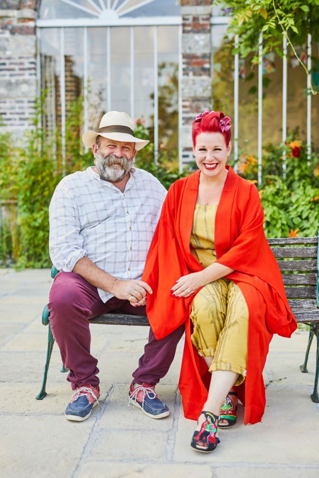 Dick & Angel Strawbridge outside in their garden