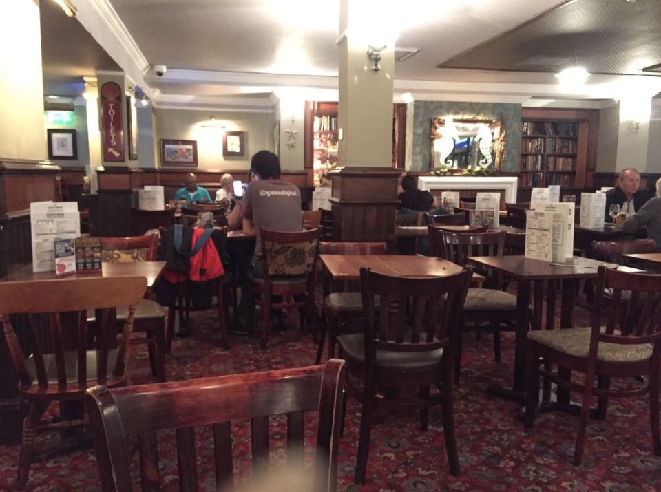 The pub is full of empty tables