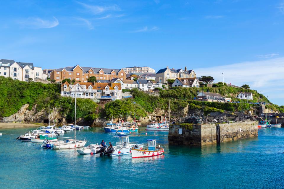 Newquay (pictured) in the south of England can often be overwhelmed with tourists in the summer months