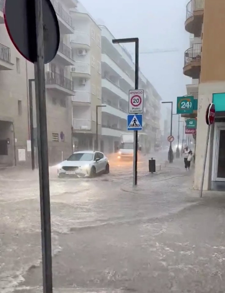 Streets have been flooded after the island was hit by torrential rain