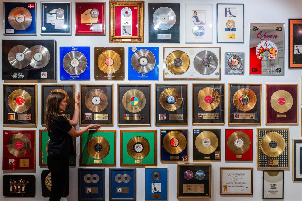 Gold records belonging to Freddie Mercury are to be put up for sale from next month