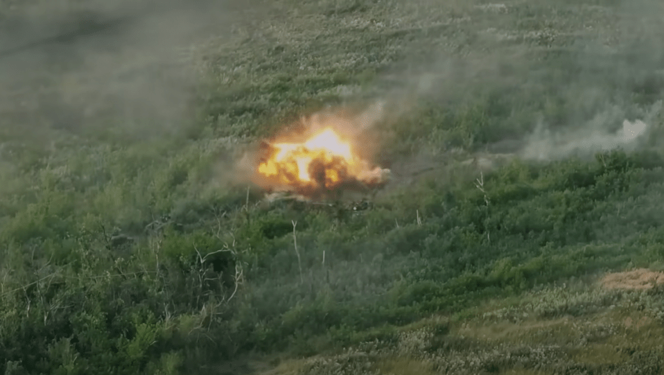 The armoured car is blown up by landmine during a battle