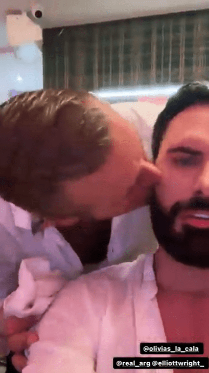 Elliott hilariously planted a kiss on Rylan’s cheek in a video