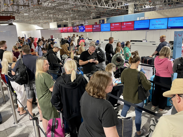 200,000 travellers were told their first available flights home could be at the end of next week, with huge queues at Gatwick Airport