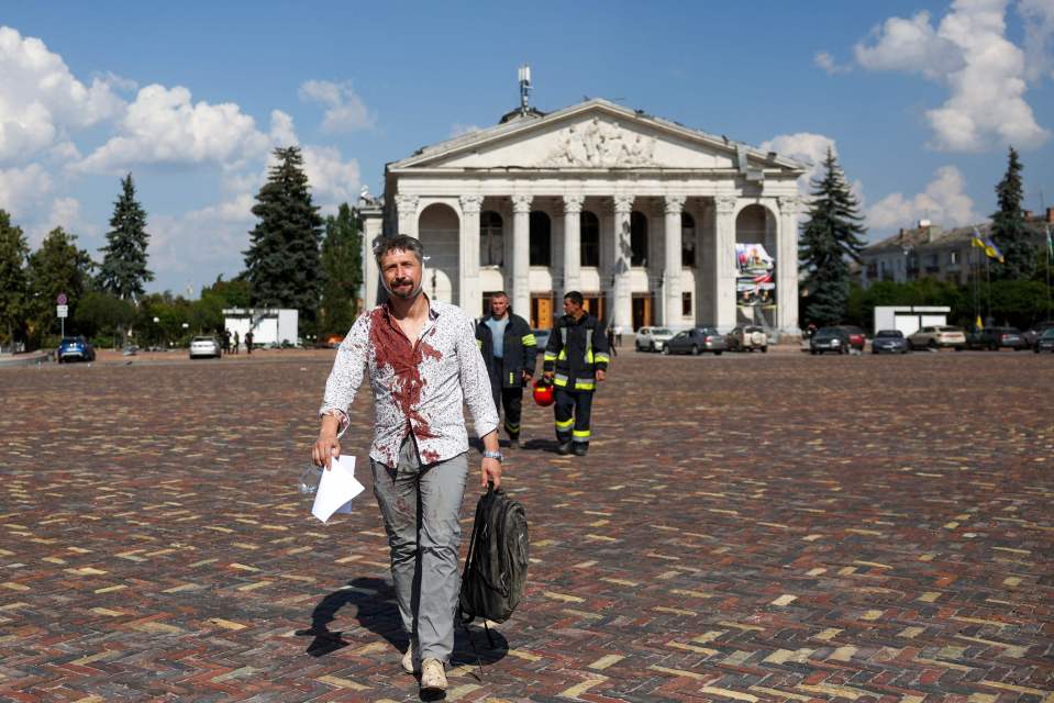 A bloodied man was seen walking through the town square