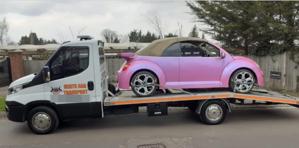 Katie got her pink VW Beetle towed