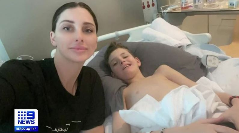 The schoolboy with his mum Jessica Bye in hospital in Melbourne, Australia