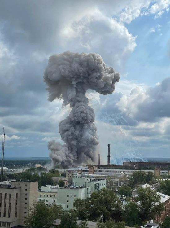 The mushroom cloud is seen in the distance after the huge explosion