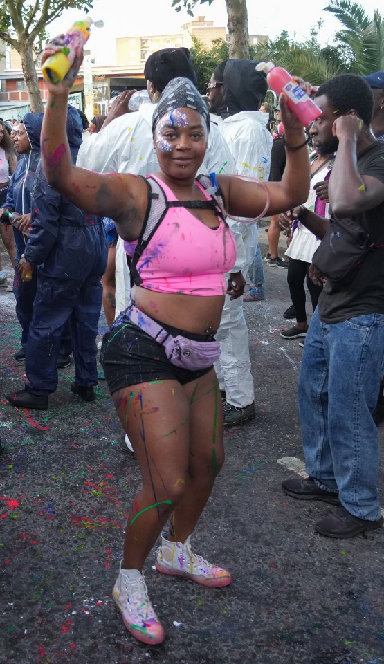 This reveller didn't let a bit of paint dampen her spirit