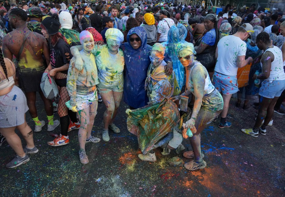 Revellers were covered in paint and flour at the start of the two-day event