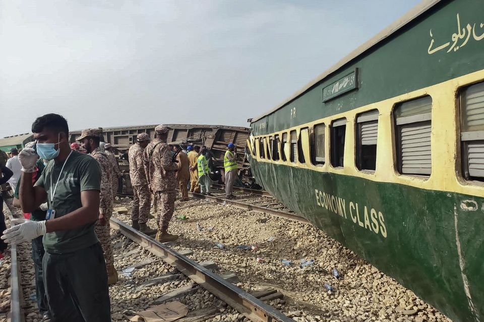 Pictures showed dozens of people at the site - with some smashing windows to help passengers