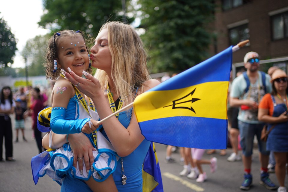 This little girl looked thrilled to be part of all the fun