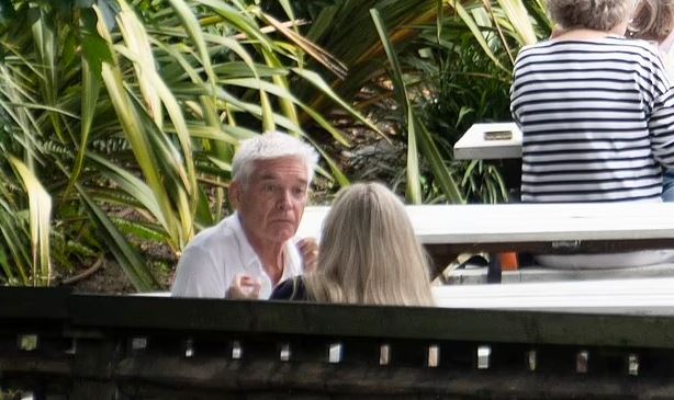 Phillip looked relaxed as he enjoyed a drink at the West London pub