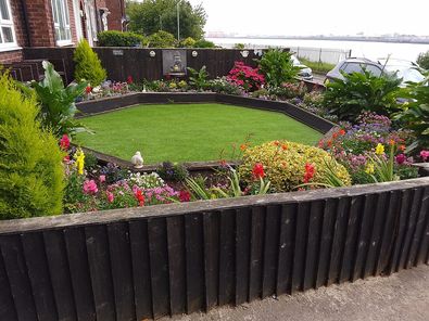 One gardening fan shared a snap of her front garden full of bargain blooms she brought back from the dead