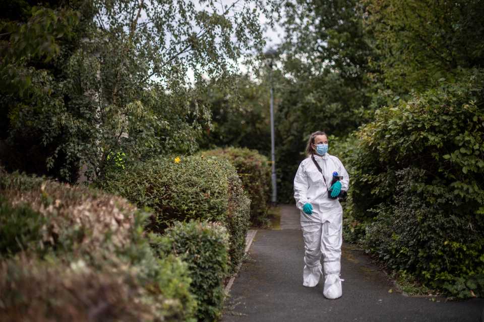 Forensic officers are still sweeping the property for clues