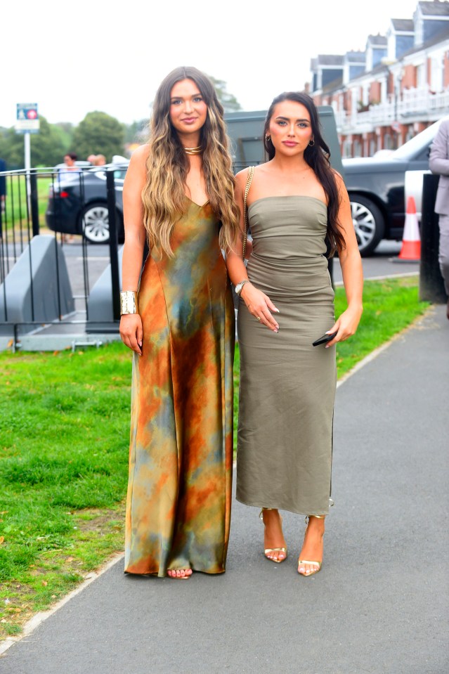 These two glam arrivals stunned in long dresses and strappy heels