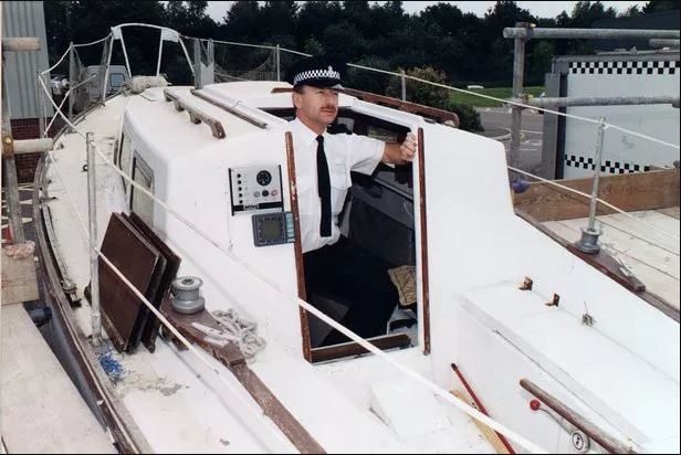 Cops aboard Walker's boat, the Lady Jane