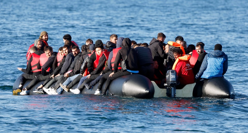 More migrants were seen packed perilously on to a dinghy heading for the UK as a Tory row ignited over the crisis