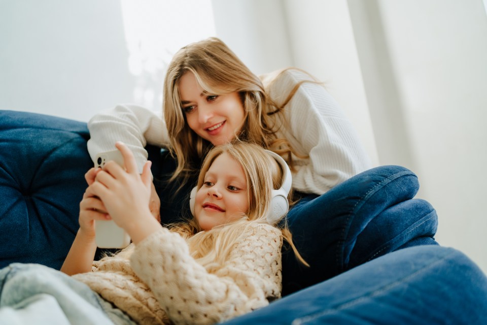 Parents face a tough choice when deciding when to give a child their first mobile phone