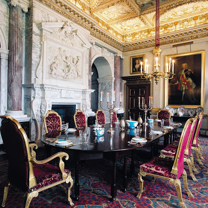 The opulent main dining room at Houghton Hall known as the Marble Parlour.